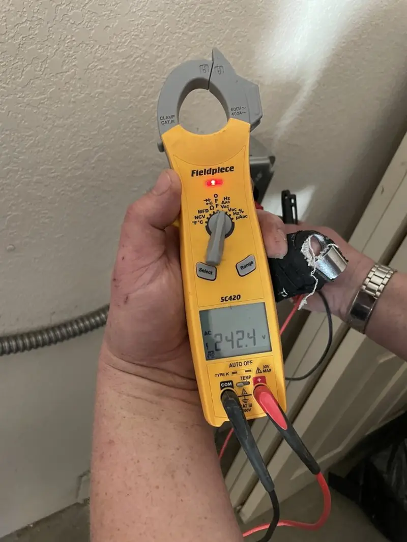 Voltage testing with clamp meter during Generator Installation in New Kingman-Butler